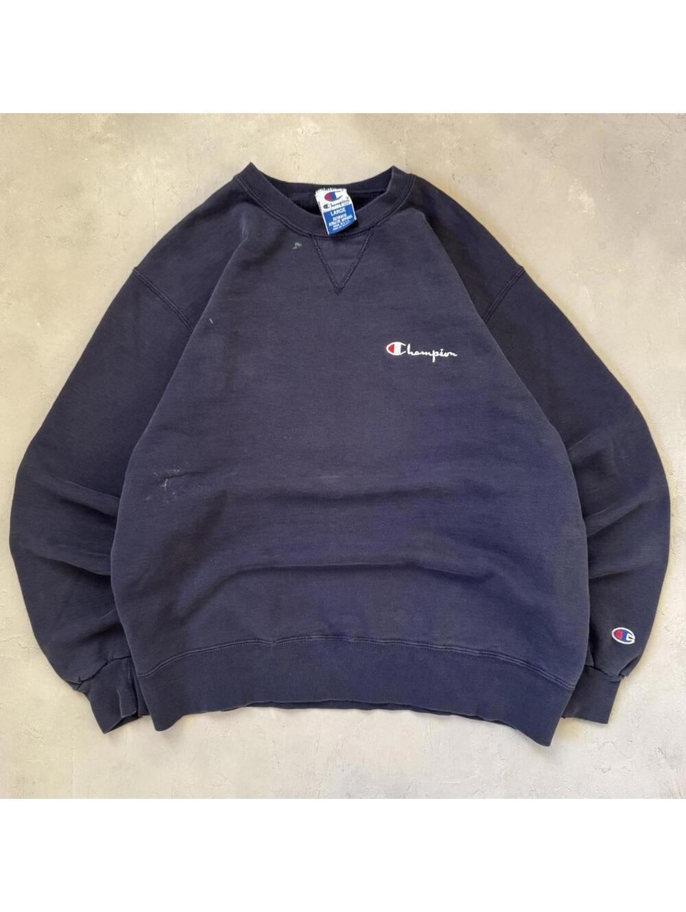 Vintage 1990s Champion Faded Navy Blue Spellout Crewneck Sweatshirt